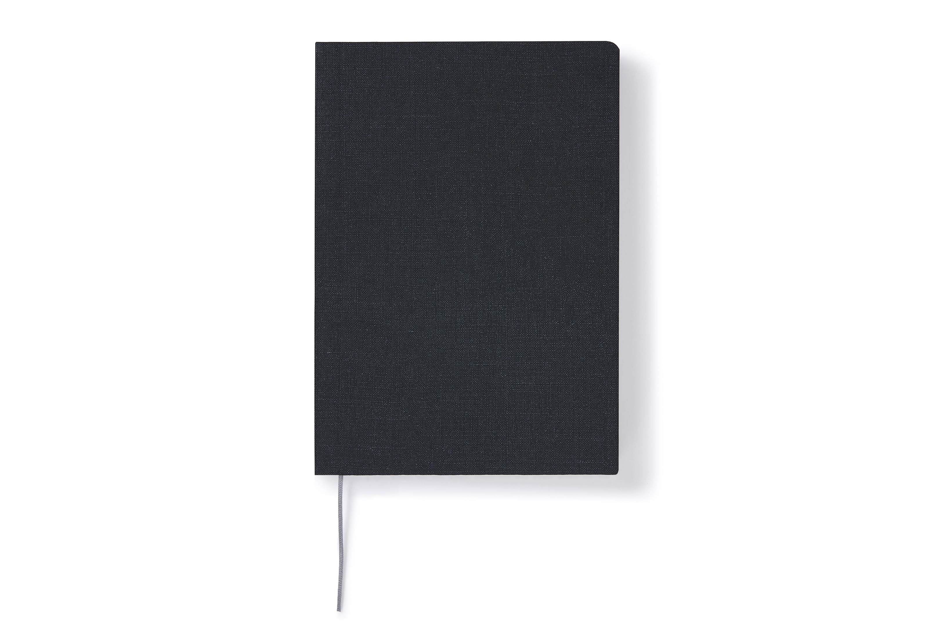 Black gold stationery set with grid notebook and memo blocks.
